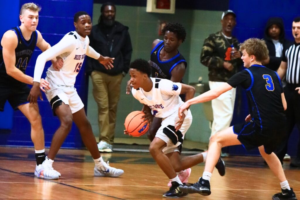 P.K. Yonge's Jayden Harriott (5) navigates his way through the Newberry defense. Photo by C.J. Gish