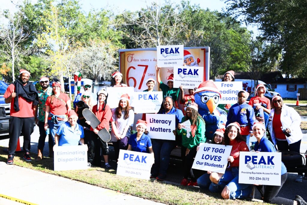 Peak Literacy at the 2025 A Very GNV Holiday Parade. Photo by C.J. Gish