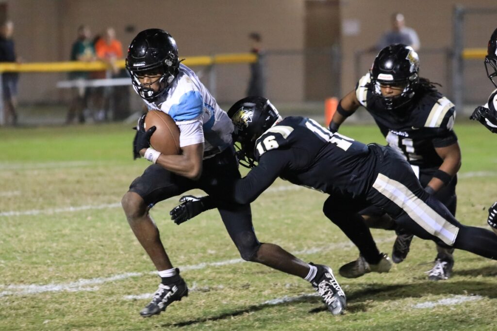 Ray Sanchez (16) brings down a West Broward punt returner.