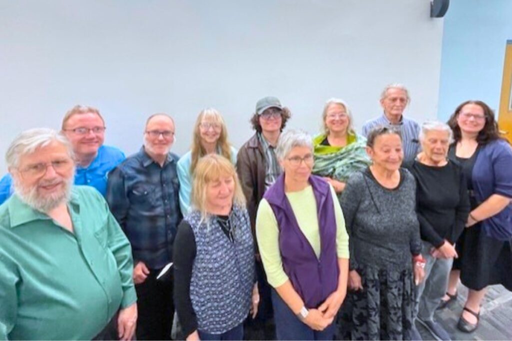 Readers at the Bacopa event gathering for a group photo. Photo by Jenny Dearinger