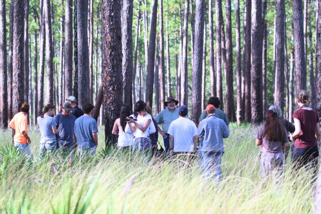 SFFGS Assistant Director Scott Sager speaks to Video Art students at the Austin Cary Forest. Photo by Suzette Cook - UF-IFAS