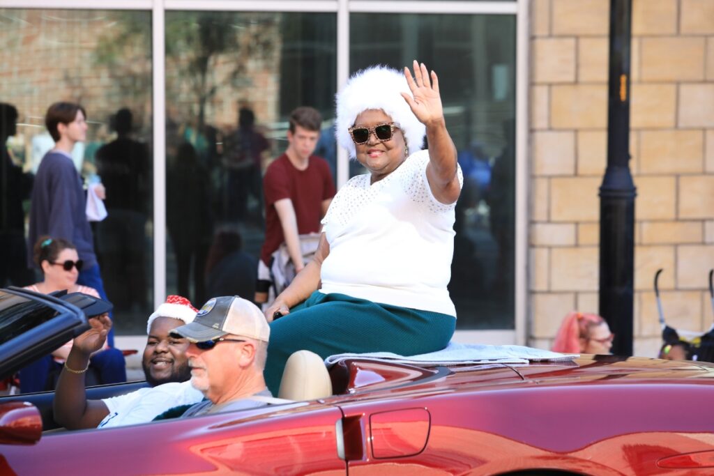 State Rep. Yvonne Hayes Hinson greets parade attendees. Photo by Seth Johnson