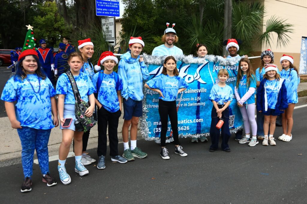 The Aquatics Club of Gainesville at the 2025 A Very GNV Holiday Parade. Photo by C.J. Gish
