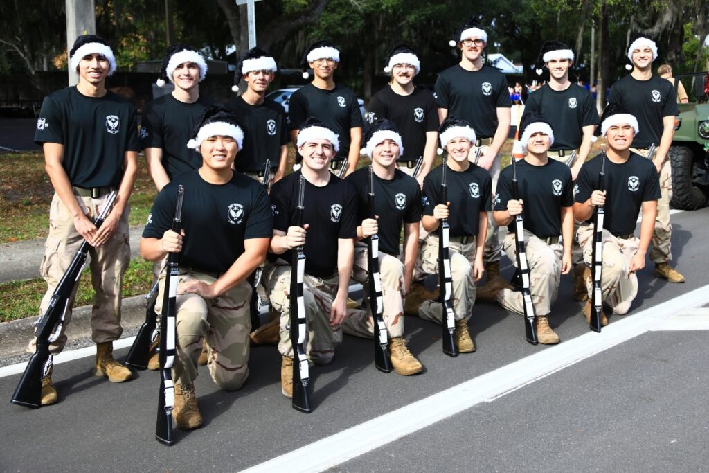 The Billy Mitchell Drill Team at the 2025 A Very GNV Holiday Parade. Photo by C.J. Gish