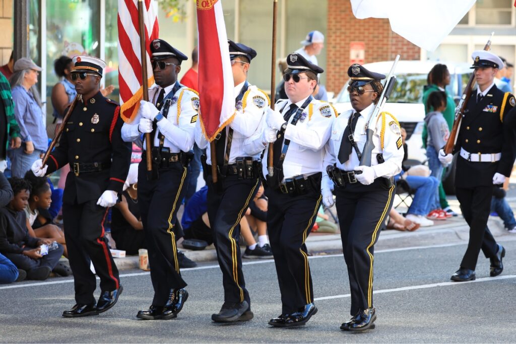 The Gainesville Police Department Honor Guard marches in A Very GNV Holiday Parade. Photo by Seth Johnson