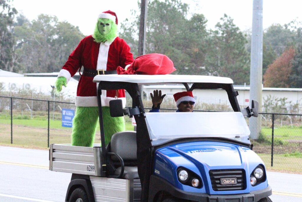 The Grinch in the UF Facilities Services Children's Christmas Parade. Photo by Nick Anschultz