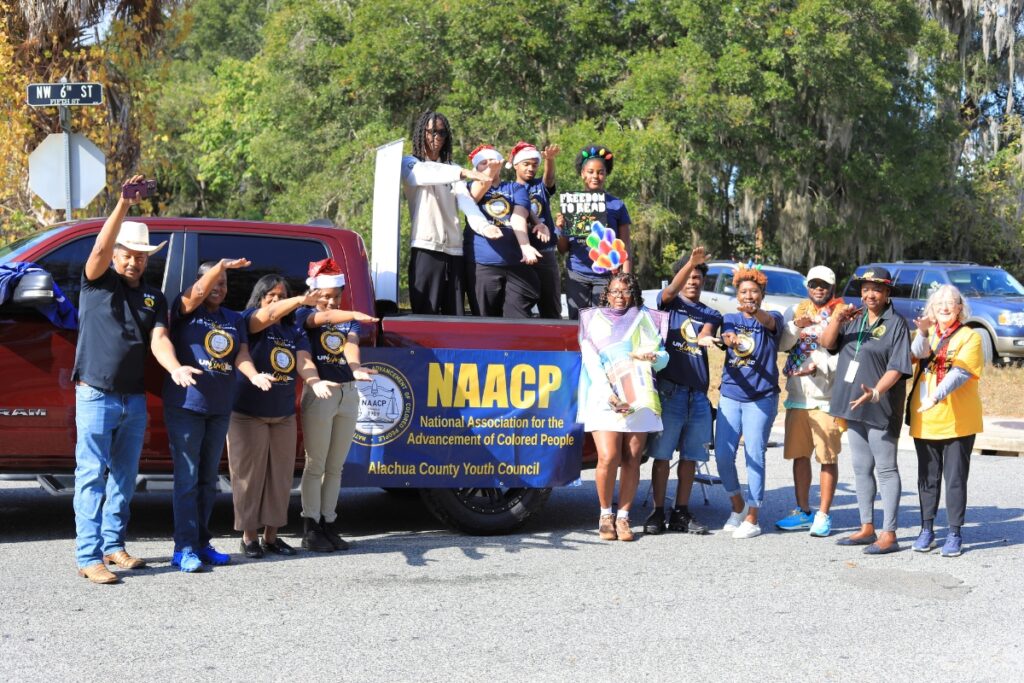 The NAACP chomping at the bite to enter the parade. Photo by Seth Johnson