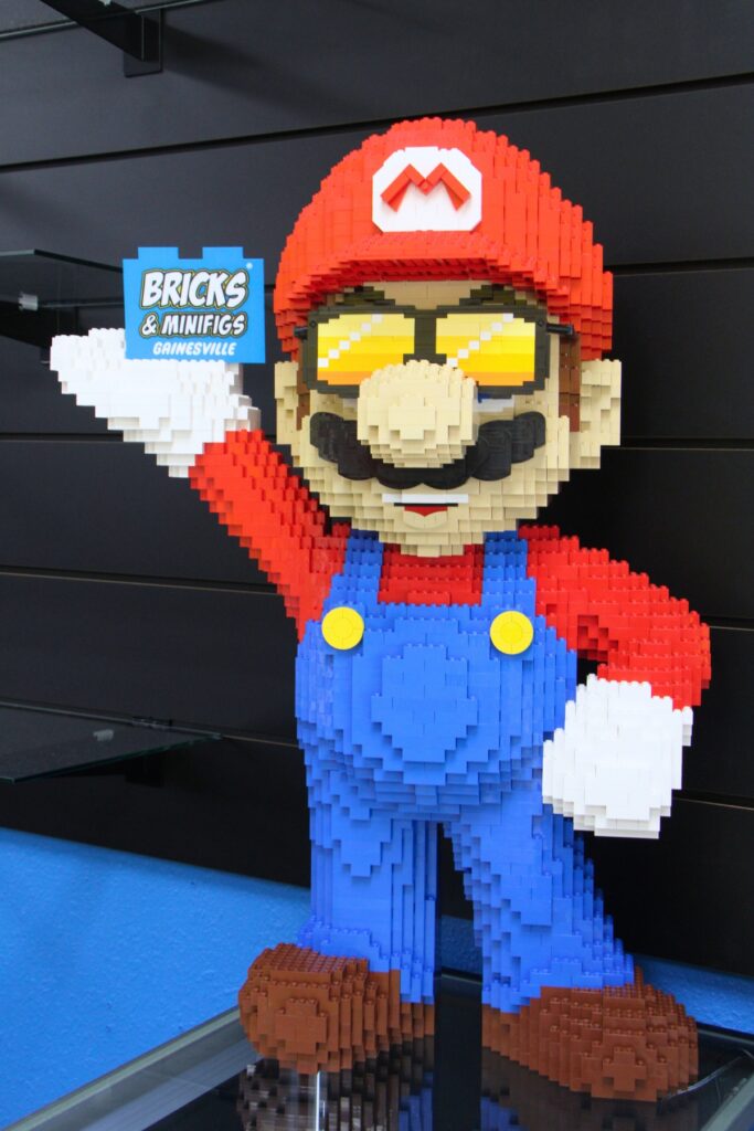 A LEGO Mario greets customers at Gainesville's Bricks & Minifigs. Photo by Lillian Hamman