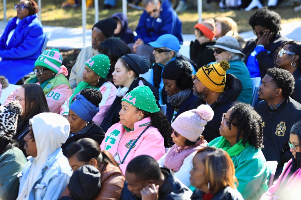 Attendees listen to Diyonne McGraw speak during the 42nd Annual Hall of Fame Enshrinement Program.