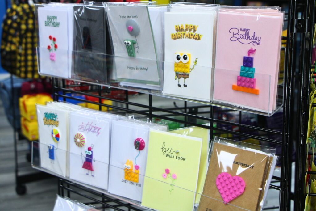 Bricks & Minifigs sells LEGO-adjacent products such as greeting cards, hats and lightsabers. Photo by Lillian Hamman
