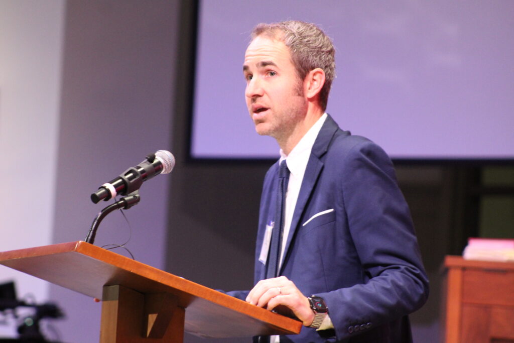 Buchholz High School teacher Ryan McNickle speaks at Thursday night's ceremony. Photo by Nick Anschultz