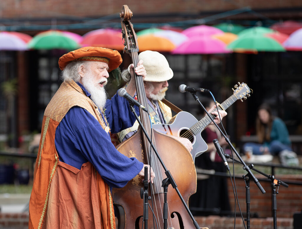Craig Merlin Broers, left, and Jerry Barry of the New Minstrel Review serenade attendees of Saturday’s Hoggetowne Medieval Faire “Sneak Peak Preview Day.”