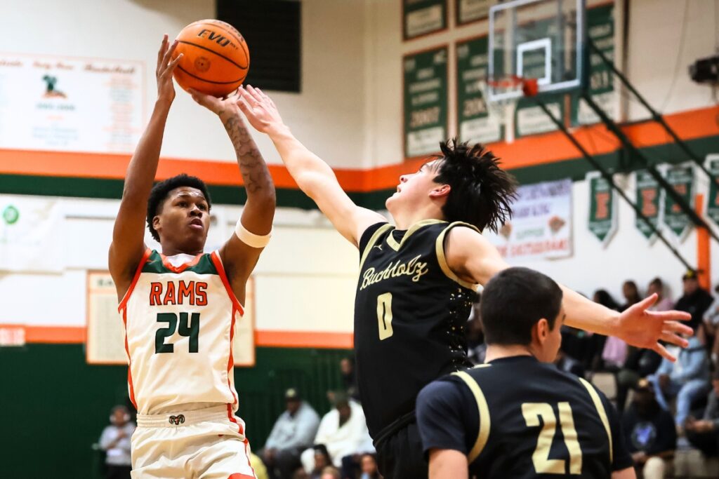 Eastside Raheem Littles (24) shoots over Buchholz Jacob Bromirski (0) on Friday night. Photo by Chris Watkins