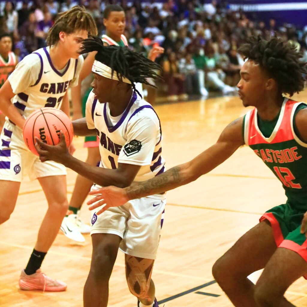 Gainesville's Willie Brooks (1) snags a defensive rebound against Eastside. Photo by C.J. Gish