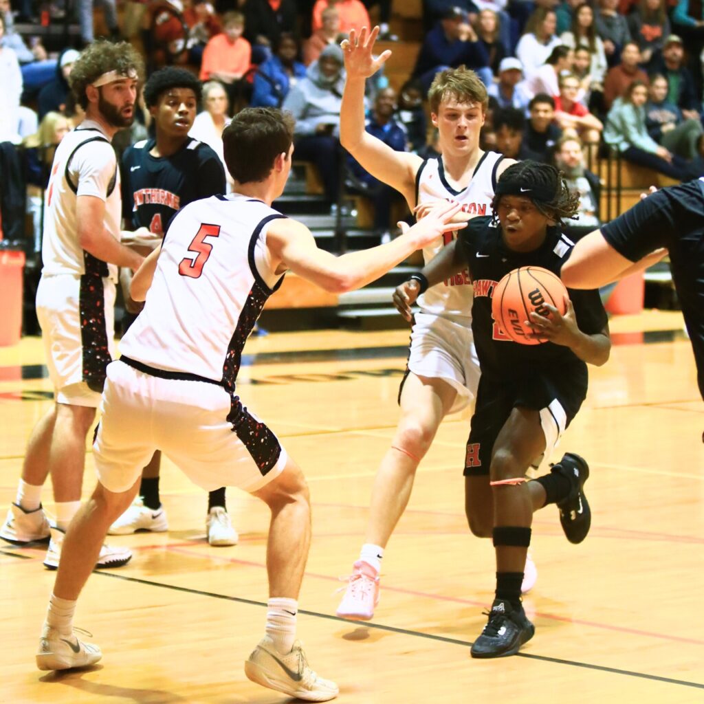 Hawthorne's Nathan Jennings (2) drives to the basket against Trenton. Photo by C.J. Gish
