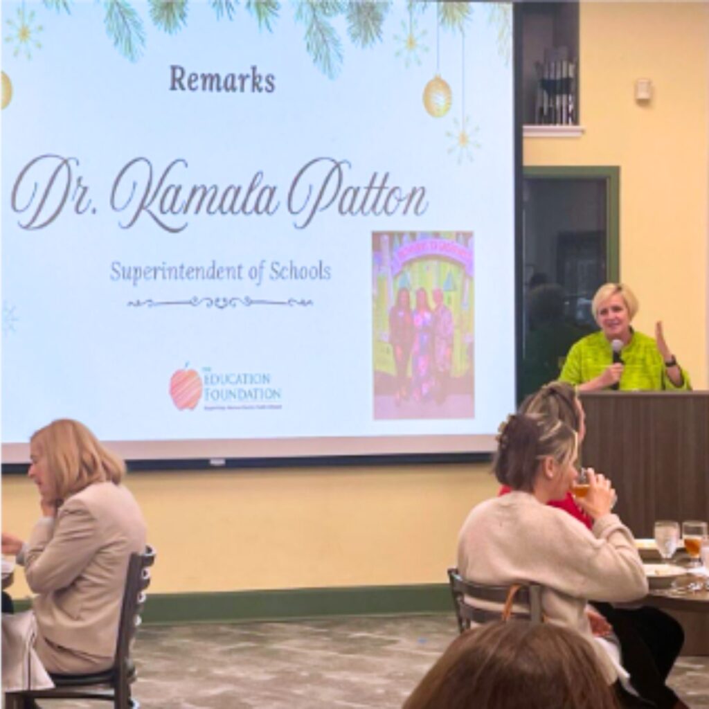 Interim Superintendent Kamela Patton speaks at the Education Foundation of Alachua County's annual holiday luncheon. Courtesy of EFAC