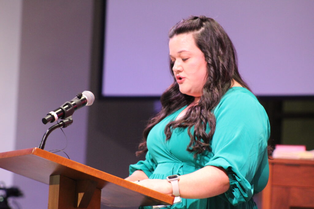 Meadowbrook Elementary School teacher Katie Dawson gives remarks at Thursday night's ceremony. Photo by Nick Anschultz