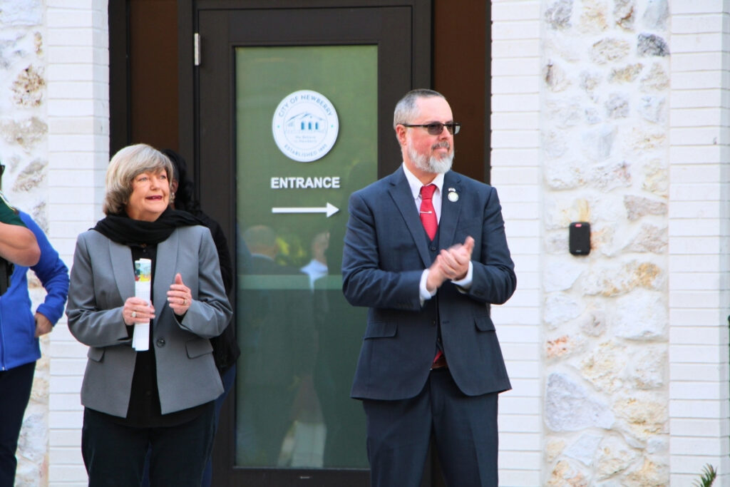 Newberry City Manager Jordan Marlowe (right) celebrated the ribbon-cutting of the new city hall. Photo by Lillian Hamman