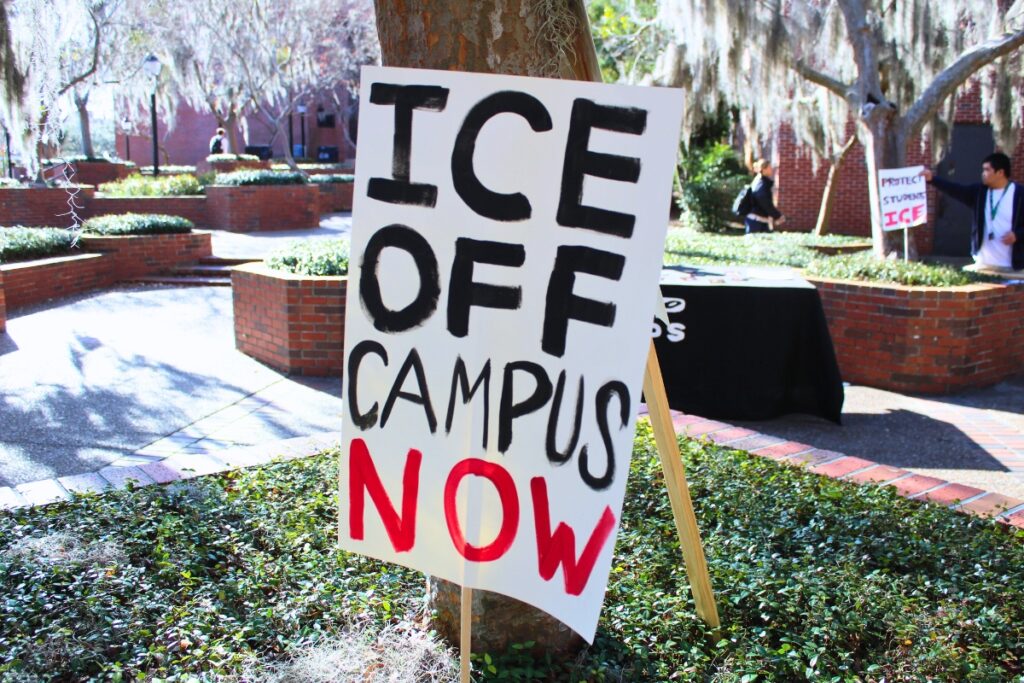 One of the anti-ICE signs that was on display in UF's Turlington Plaza on Friday. Photo by Nick Anschultz