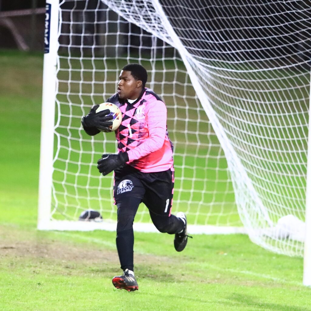 P.K. Yonge goalkeeper Regan Hollinger with a save against Williston. Photo by C.J. Gish