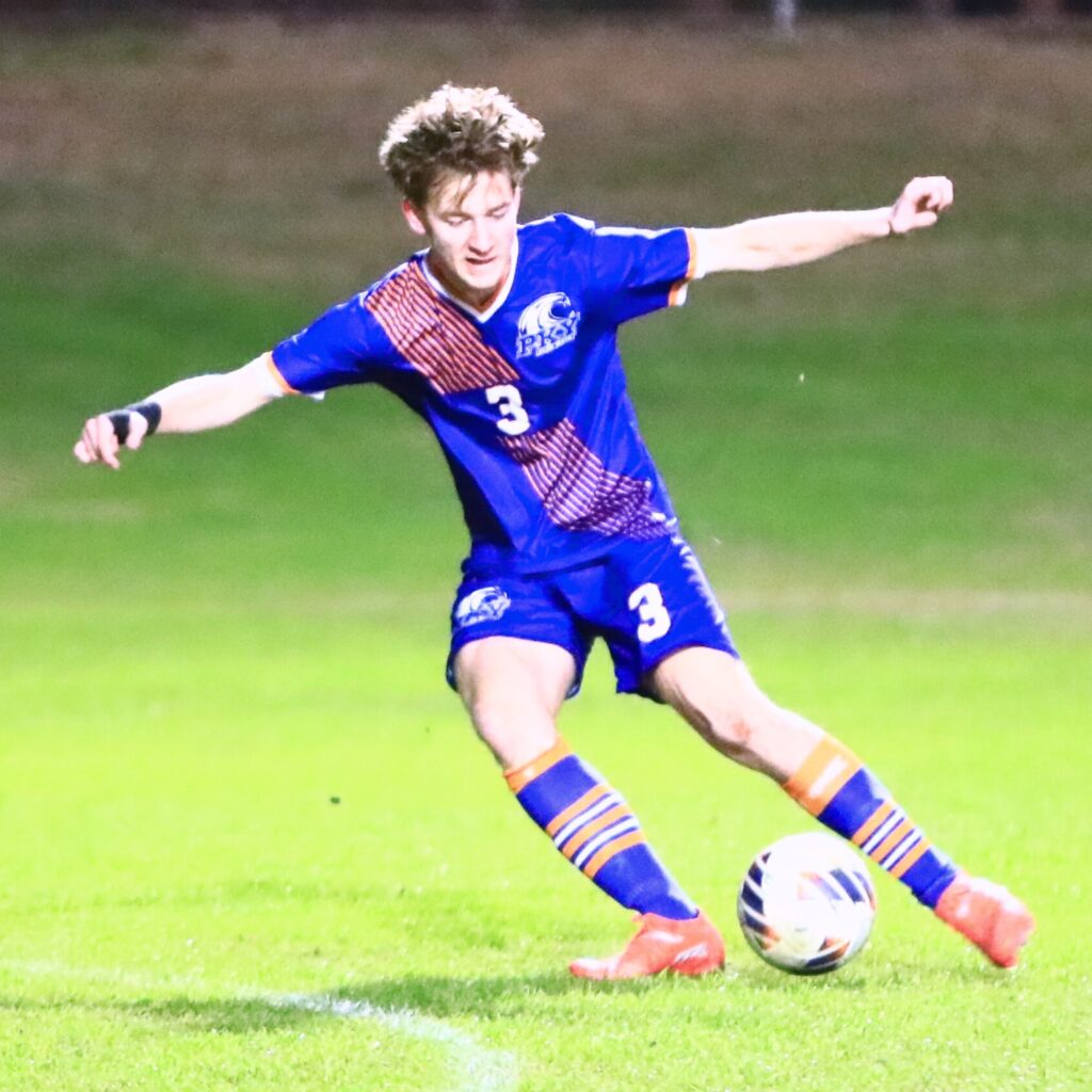 P.K. Yonge's Jack Reichardt (3) kicks in the first goal of the contest to go up 1-0 over Williston. Photo by C.J. Gish