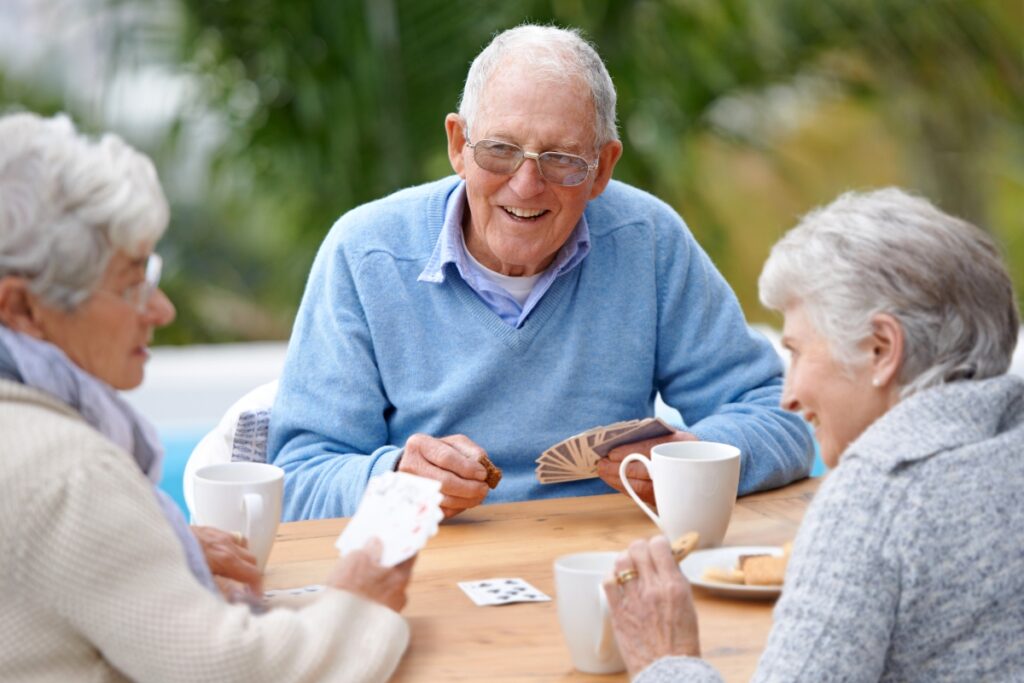 Senior citizens playing cards. Metro Creative