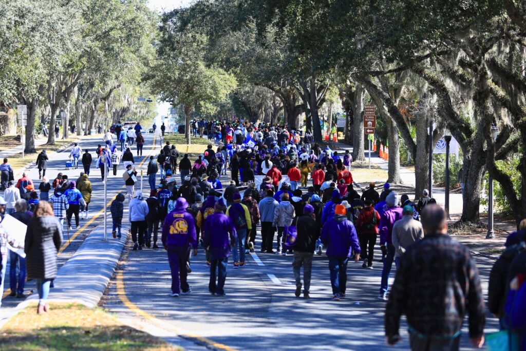 The MLK Jr. Parade proceeds down University Avenue.