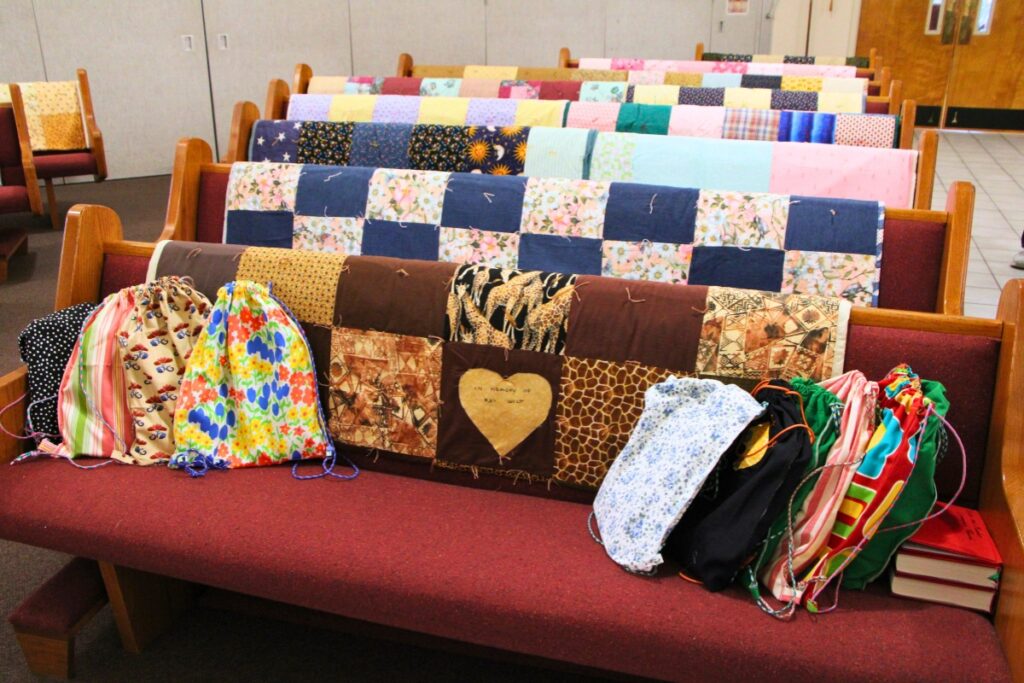 The pews of Gethsemane Lutheran Church ready for the blessing of The Knotty Ladies' quilts. Photo by Lillian Hamman