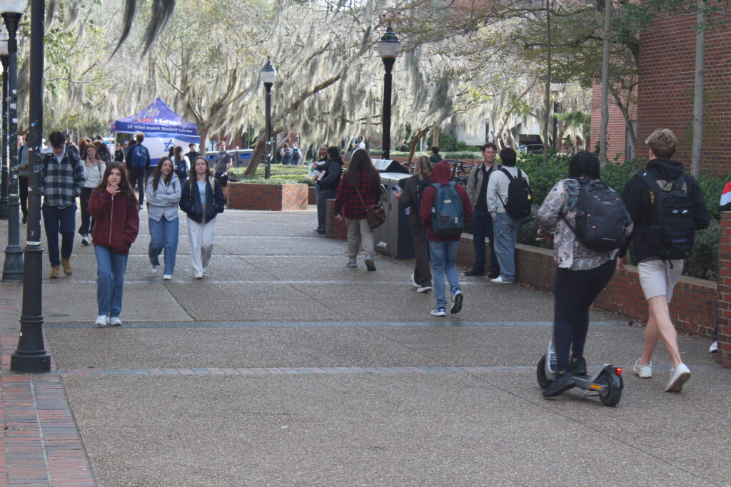 University of Florida students make their way through Turlington Plaza on Monday morning. Photo by Nick Anschultz