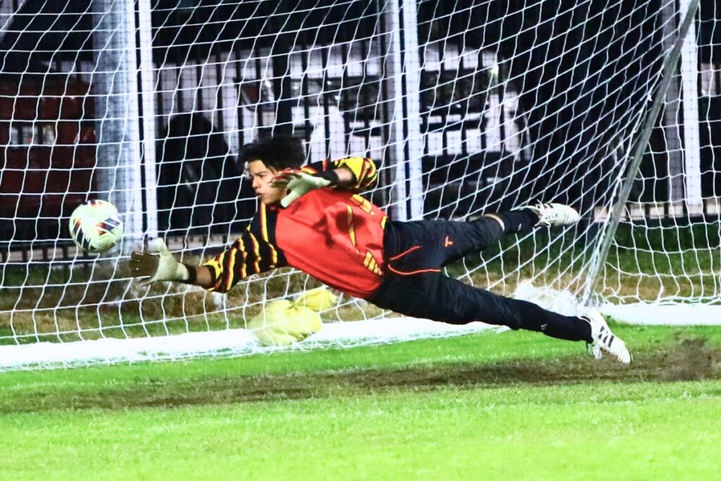 Williston goalkeeper Jamie Merced deflects a P.K. Yonge shot on goal. Photo by C.J. Gish
