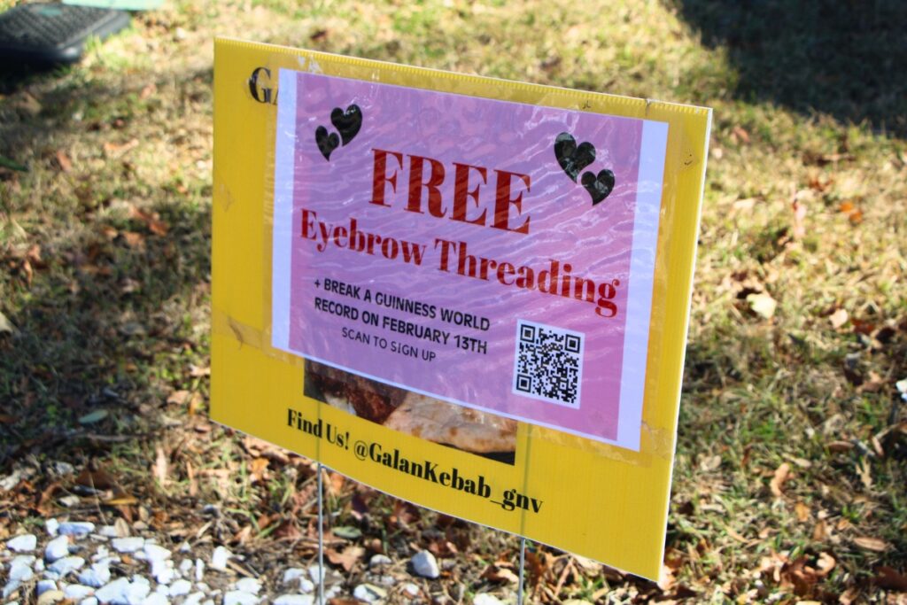 641 people signed up to have their eyebrows threaded for free during the world record attempt, but only 337 showed. Photo by Lillian Hamman