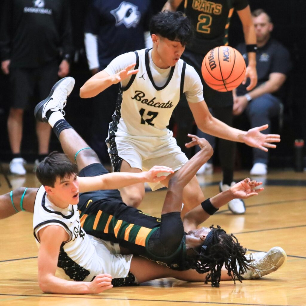 Buchholz and Forest (Ocala) players scramble for the ball in the Class 6A-Region 1 semifinal. Photo by Seth Johnson