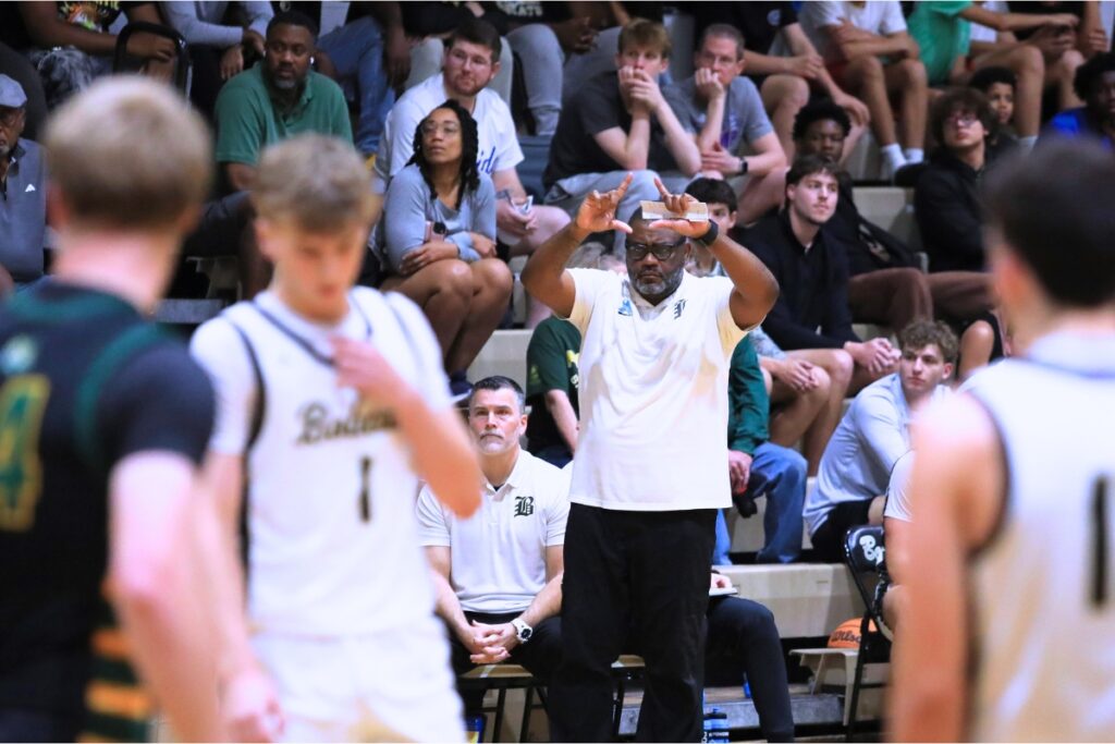 Buchholz coach Elliot Harris calls a play against Forest (Ocala) in the Class 6A-Region 1 semifinal. Photo by Seth Johnson