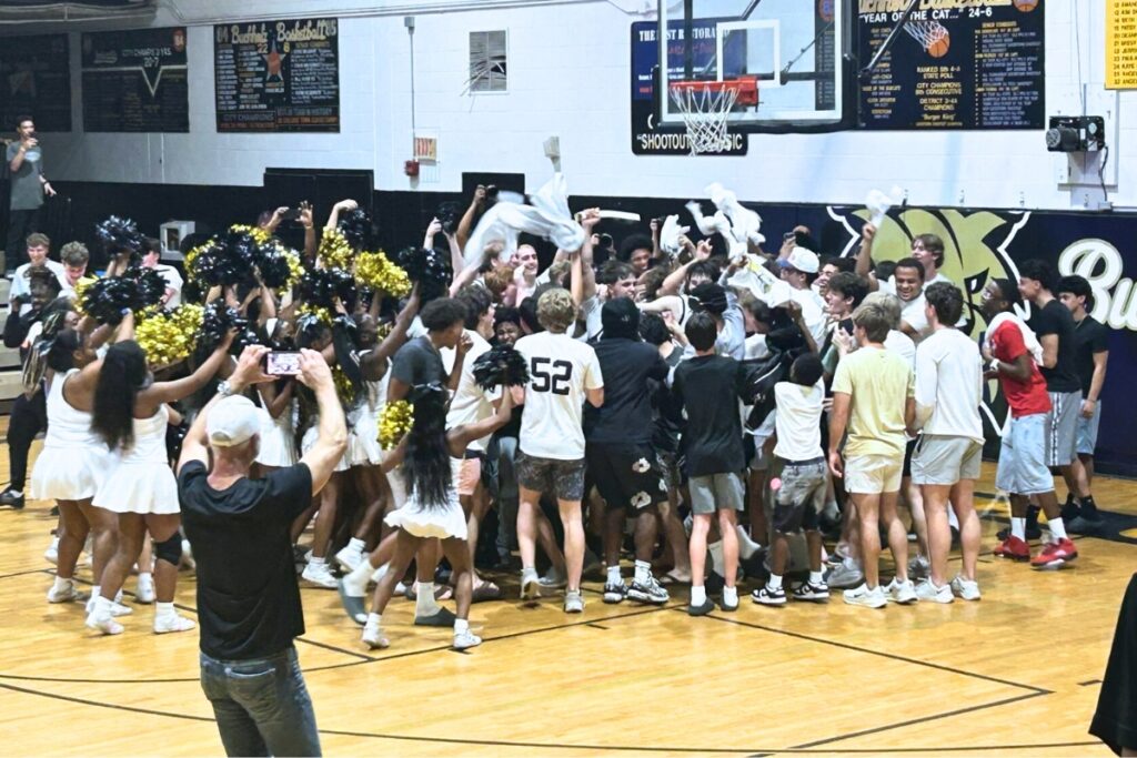 Buchholz players and fans celebrate after the Bobcats defeated Forest (Ocala) in the Class 6A-Region 1 semifinal. Photo by Marty Pallman