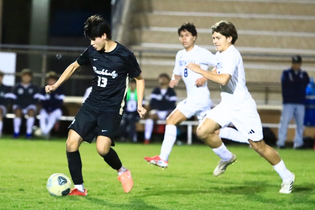 Buchholz's Daniel Prieto (13) brings the ball downfield against South Lake (Groveland) in the Class 6A-Region 1 Semifinals. Photo by C.J. Gish