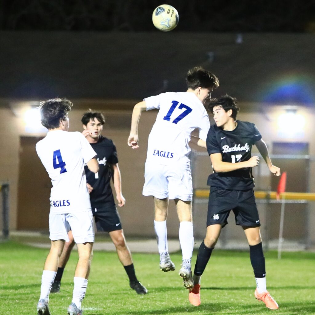 Buchholz's Daniel Prieto (13) with a header toward the goal against South Lake (Groveland) in the Class 6A-Region 1 Semifinals. Photo by C.J. Gish