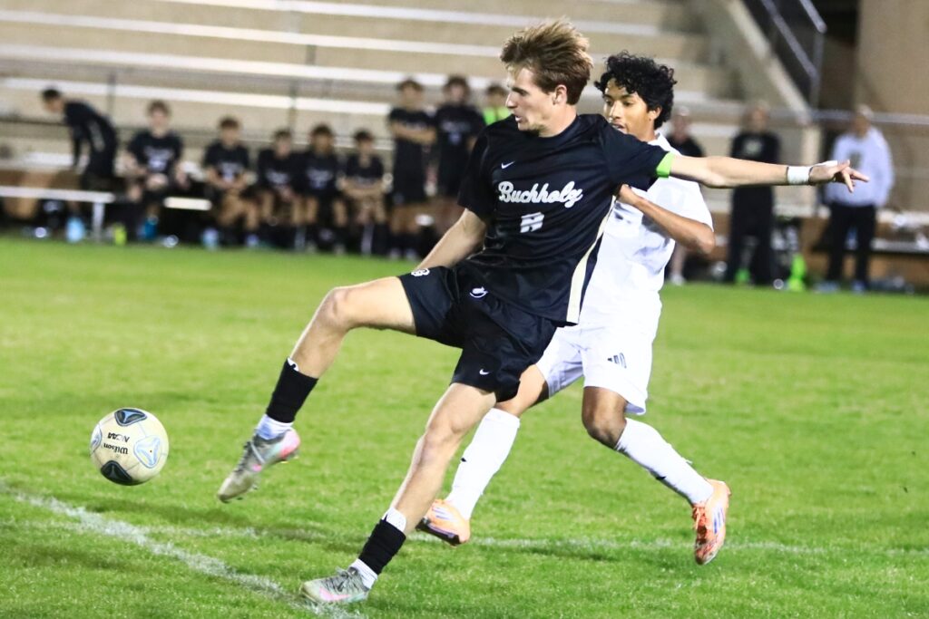 Buchholz's Timmy Ortiz (8) with a kick against South Lake (Groveland) in the Class 6A-Region 1 Semifinals. Photo by C.J. Gish