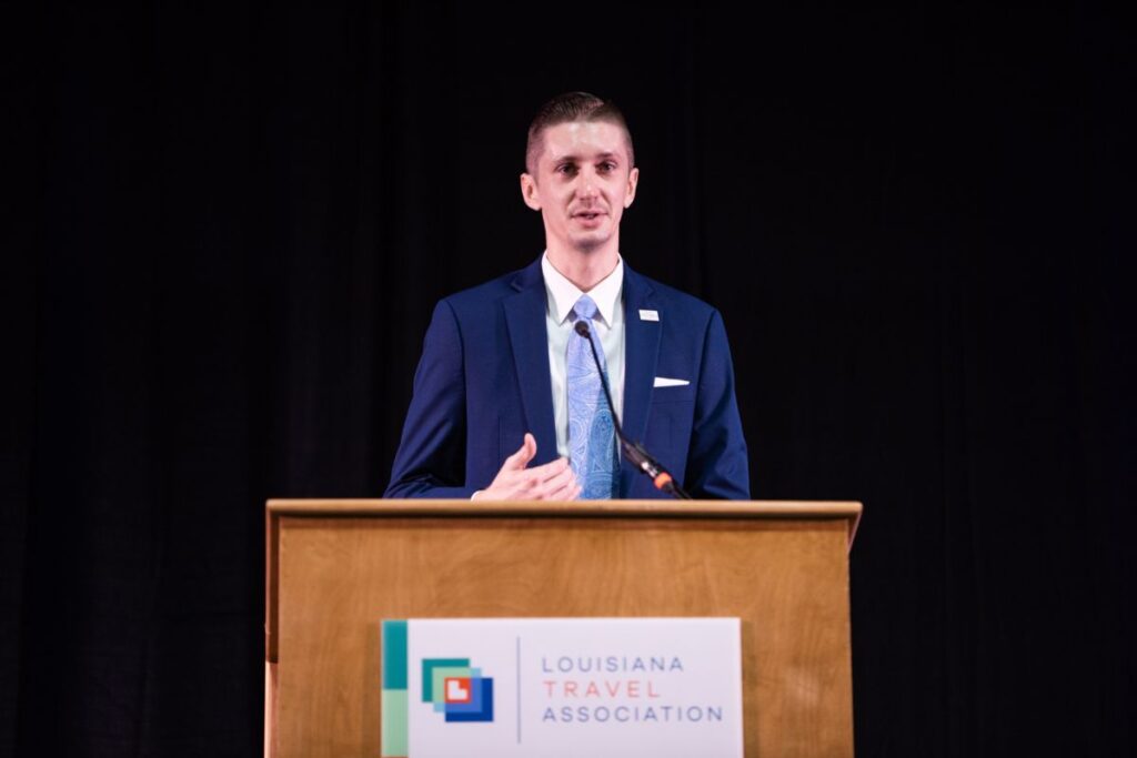 Cody Gray speaks at a Louisiana Travel Association event.