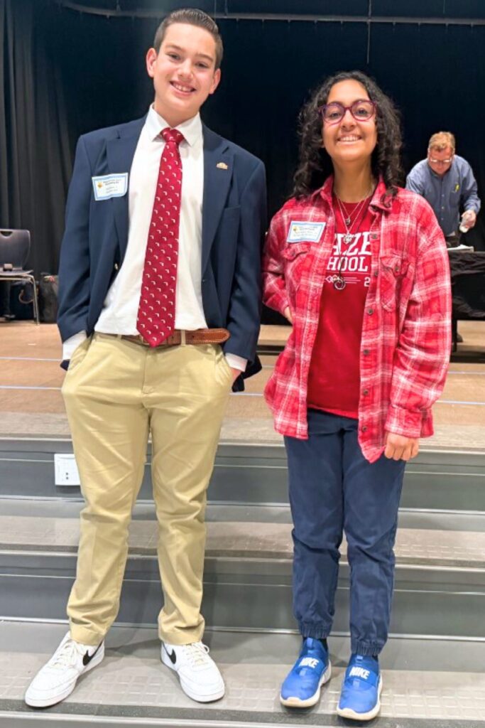 Cooper Campen (left) and Isabella Mendoza took first and second place, respectively, at the 2026 Alachua County Spelling Bee. Courtesy of Brad Campen