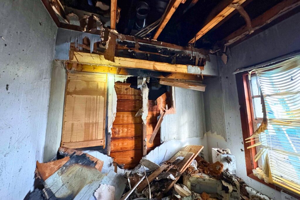 Firefighters extinguished a kitchen fire in a cabin that spread into an attic at Lachloosa Fish Camp on Tuesday morning.