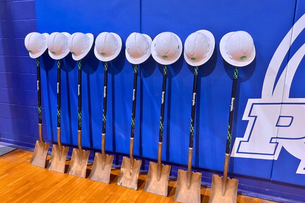Groundbreaking shovels lean up against the wall in the current gym on Tuesday. Photo by Nick Anschultz