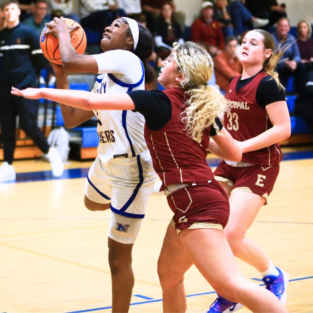 Newberry's Brandy Whitfield (1) drives to the basket against Episcopal (Jacksonville) in the Class 3A-Region 1 Quarterfinals. Photo by C.J. Gish