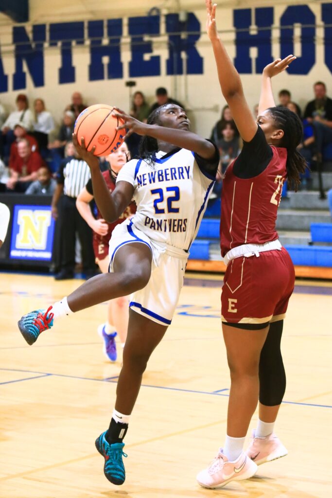 Newberry's Destiny Neal (22) puts up a shot against Episcopal (Jacksonville) in the Class 3A-Region 1 Quarterfinals. Photo by C.J. Gish