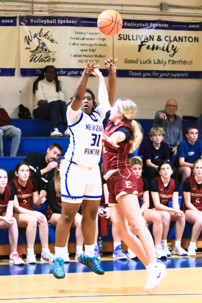 Newberry's Jada Brown (30) puts up a 3-point shot against Episcopal (Jacksonville) in the Class 3A-Region 1 Quarterfinals. Photo by C.J. Gish