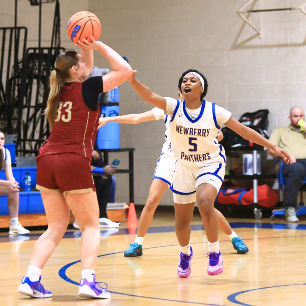 Newberry's Londyn Hines (5) contests a shot against Episcopal (Jacksonville) in the Class 3A-Region 1 Quarterfinals. Photo by C.J. Gish