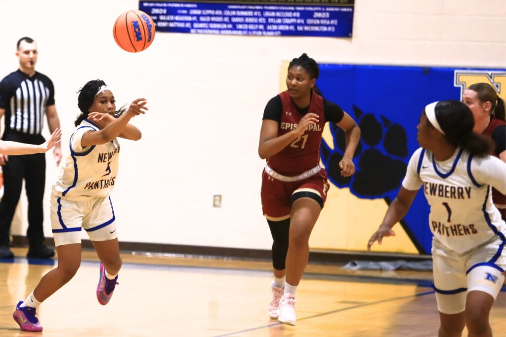 Newberry's Londyn Hines (5) launches the ball downcourt against Episcopal (Jacksonville) in the Class 3A-Region 1 Quarterfinals. Photo by C.J. Gish
