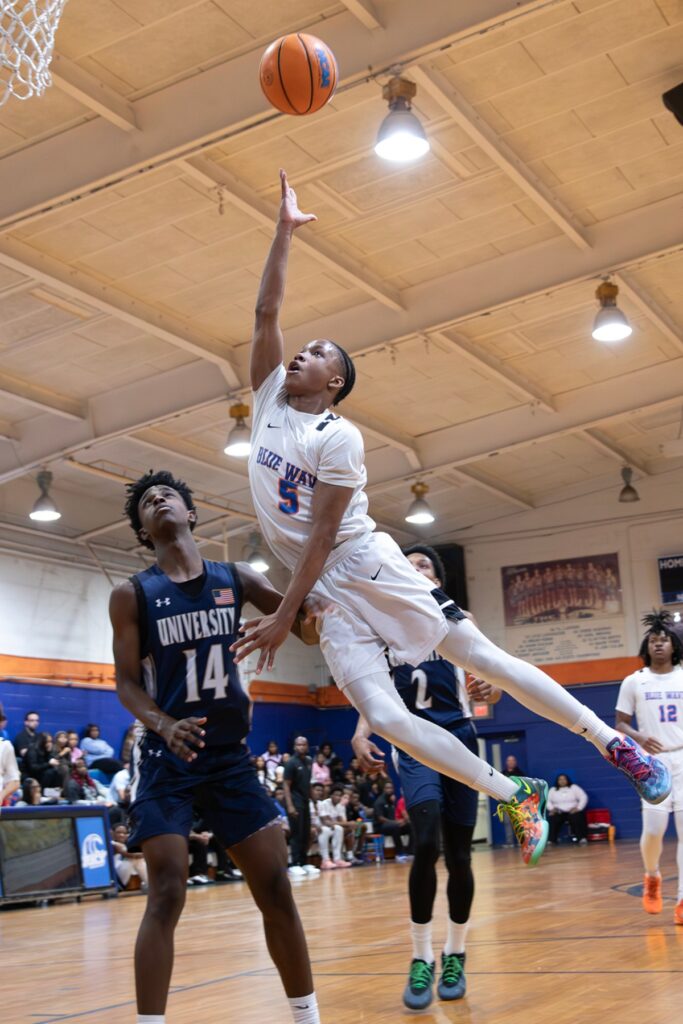 P.K. Yonge's Jayden Harriott (5) puts up a shot against University Christian (Jacksonville) in the Class 2A-Region 1 Quarterfinals. Photo by Megan V. Winslow