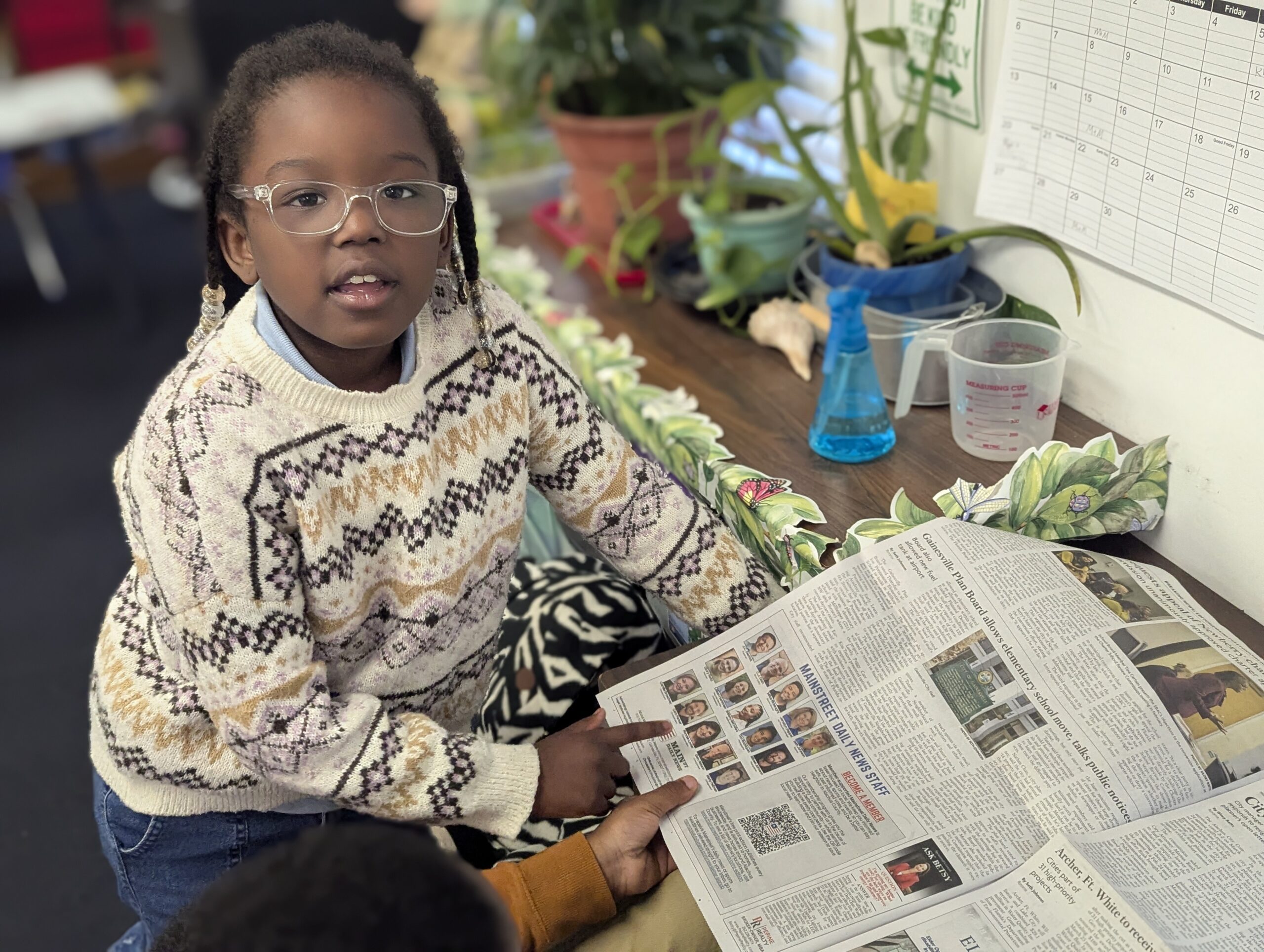 Student reading newspaper