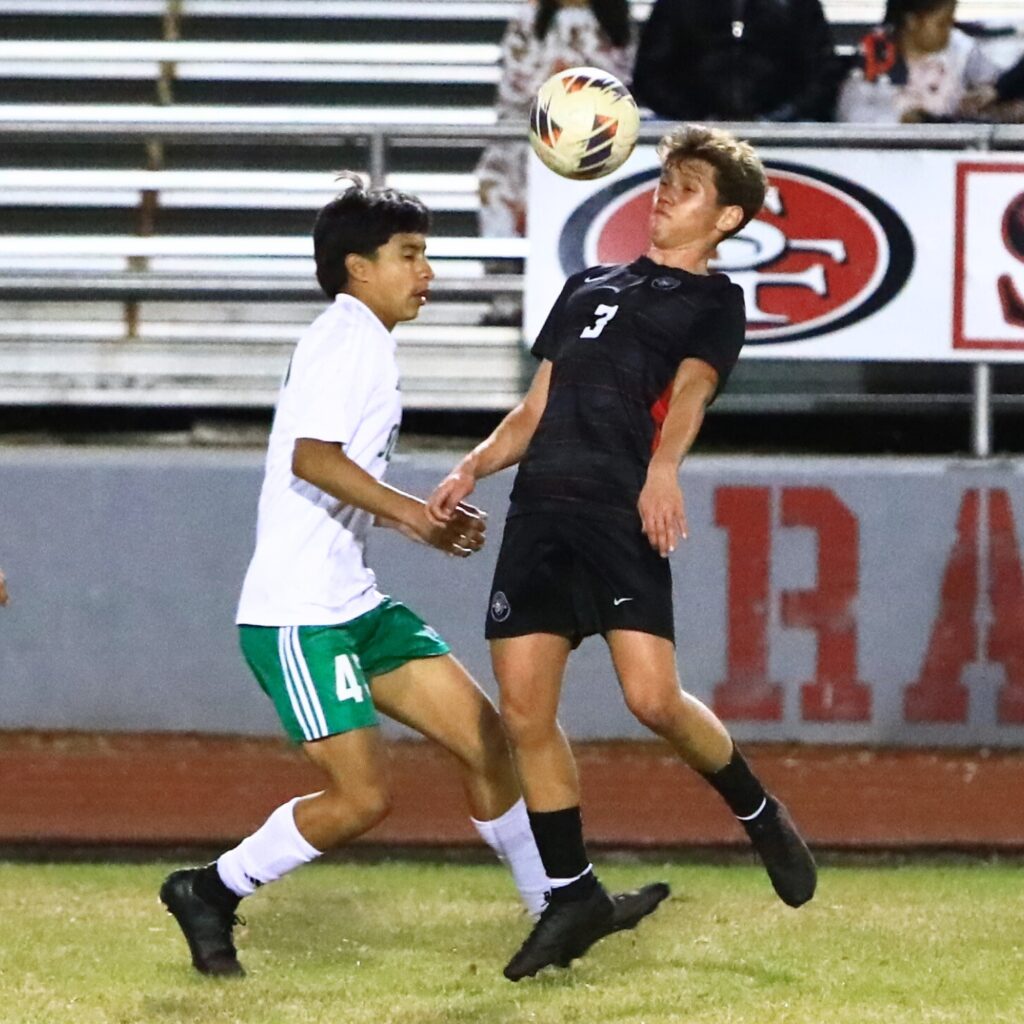 Santa Fe's Caleb Freeman (3) attempts to control the ball against Suwannee in the Class 3A-Region 1 Quarterfinals. Photo by C.J. Gish