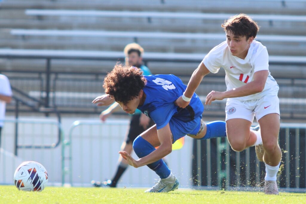 Santa Fe's Hayden Hensley (14) goes for the ball against Somerset Academy-Canyons (Boynton Beach) in the Class 3A state semifinals. Photo by Vinnie Cammarano